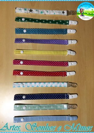 Prende Chuchas tecido plastificado